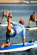 SUP Yoga instructor and students