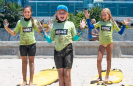 Surfing girls at camp